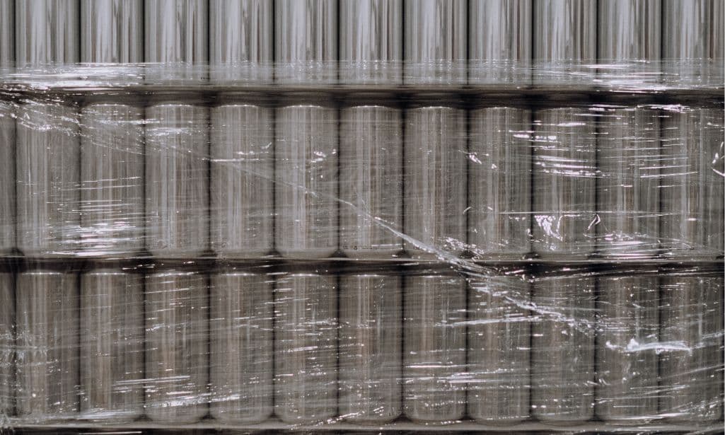 Cans wrapped in pallet wrap 